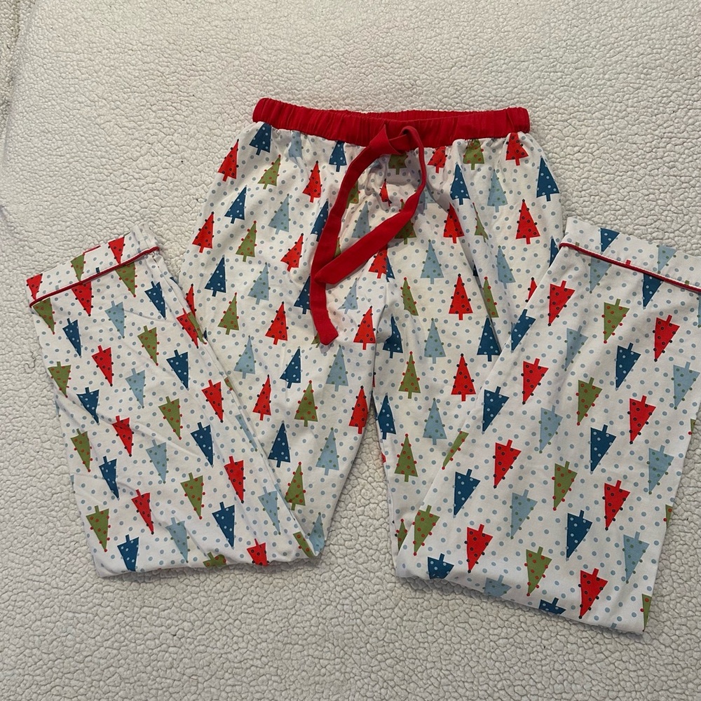 NWOT women’s small pajama pants with holiday trees.